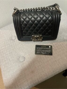 CHANEL Black Quilted Leather Boy Shoulder Bag with Silver-Tone Hardware